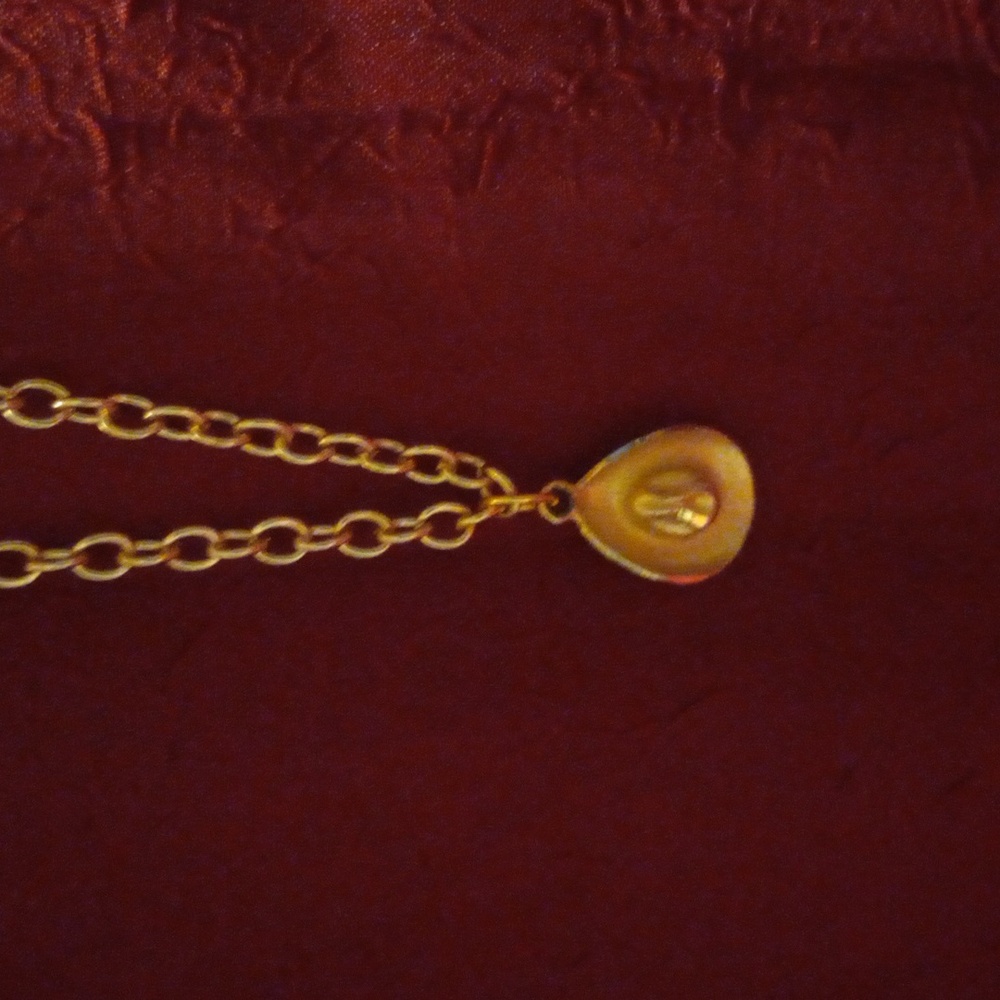 Cowboy hat pendant on a rolo chain